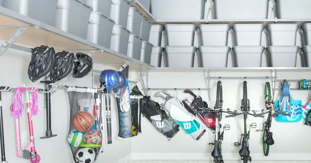 a garage filled with lots of toys and bicycles .